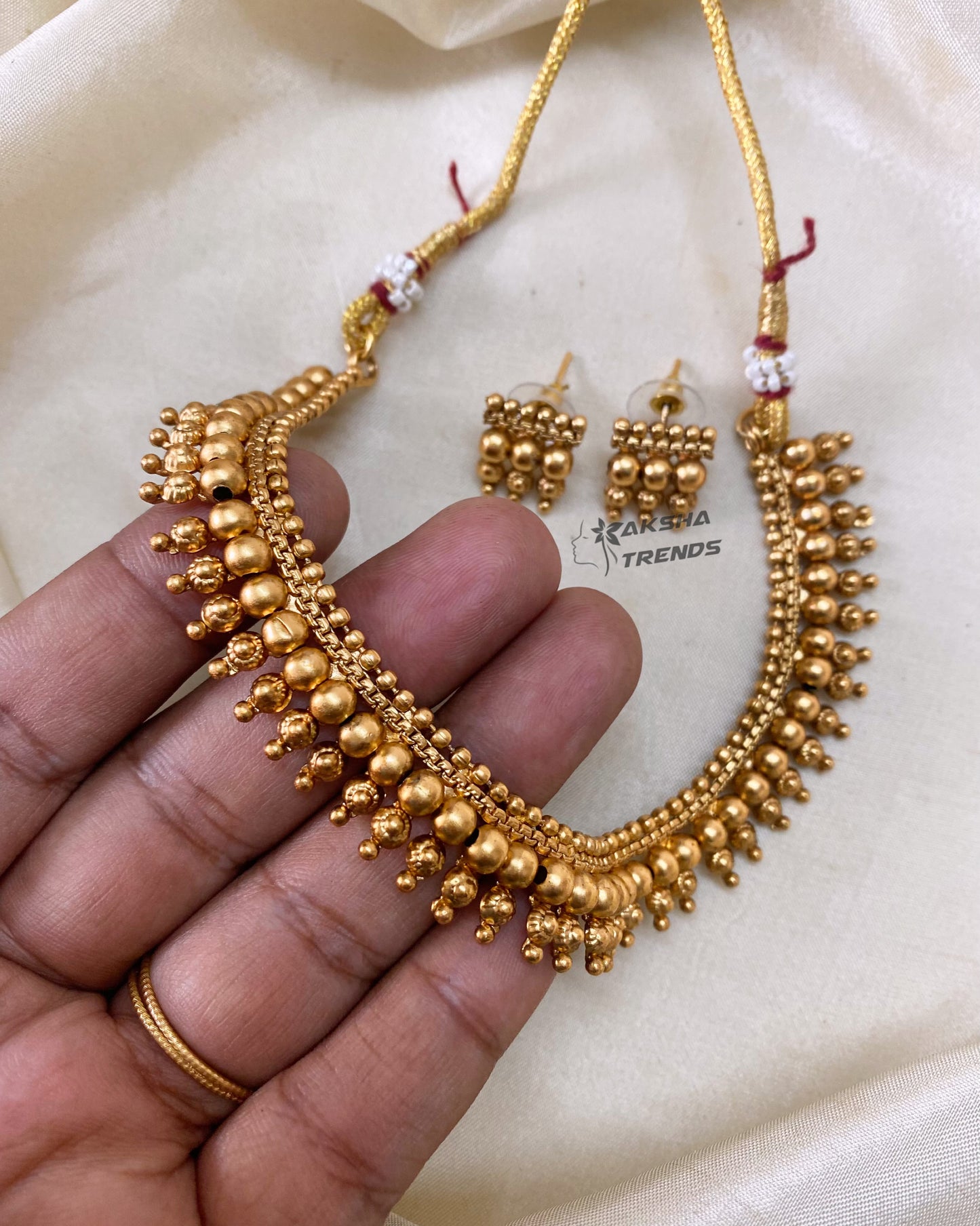 Golden bead necklace