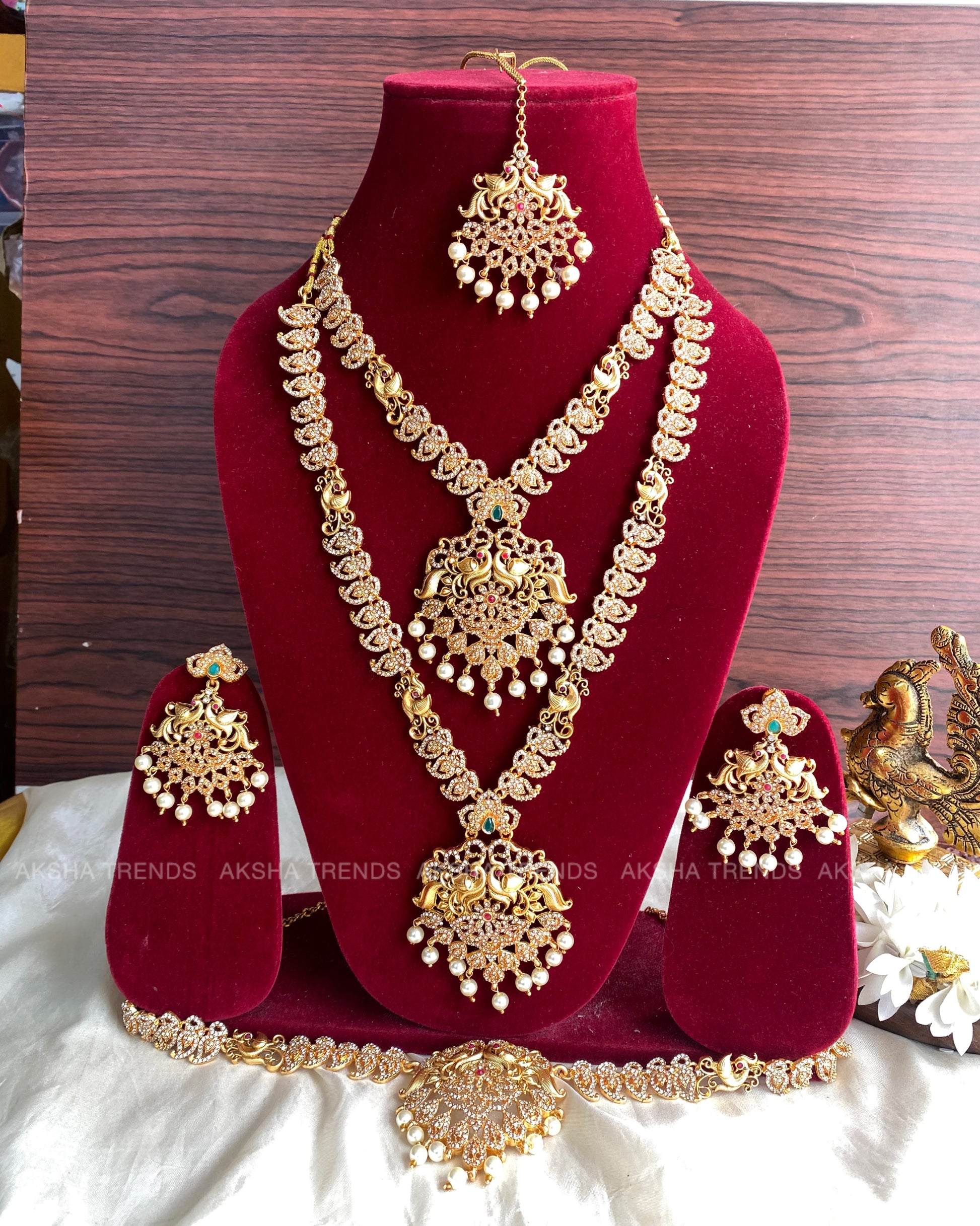 Peacock stone bridal combo Aksha Trends