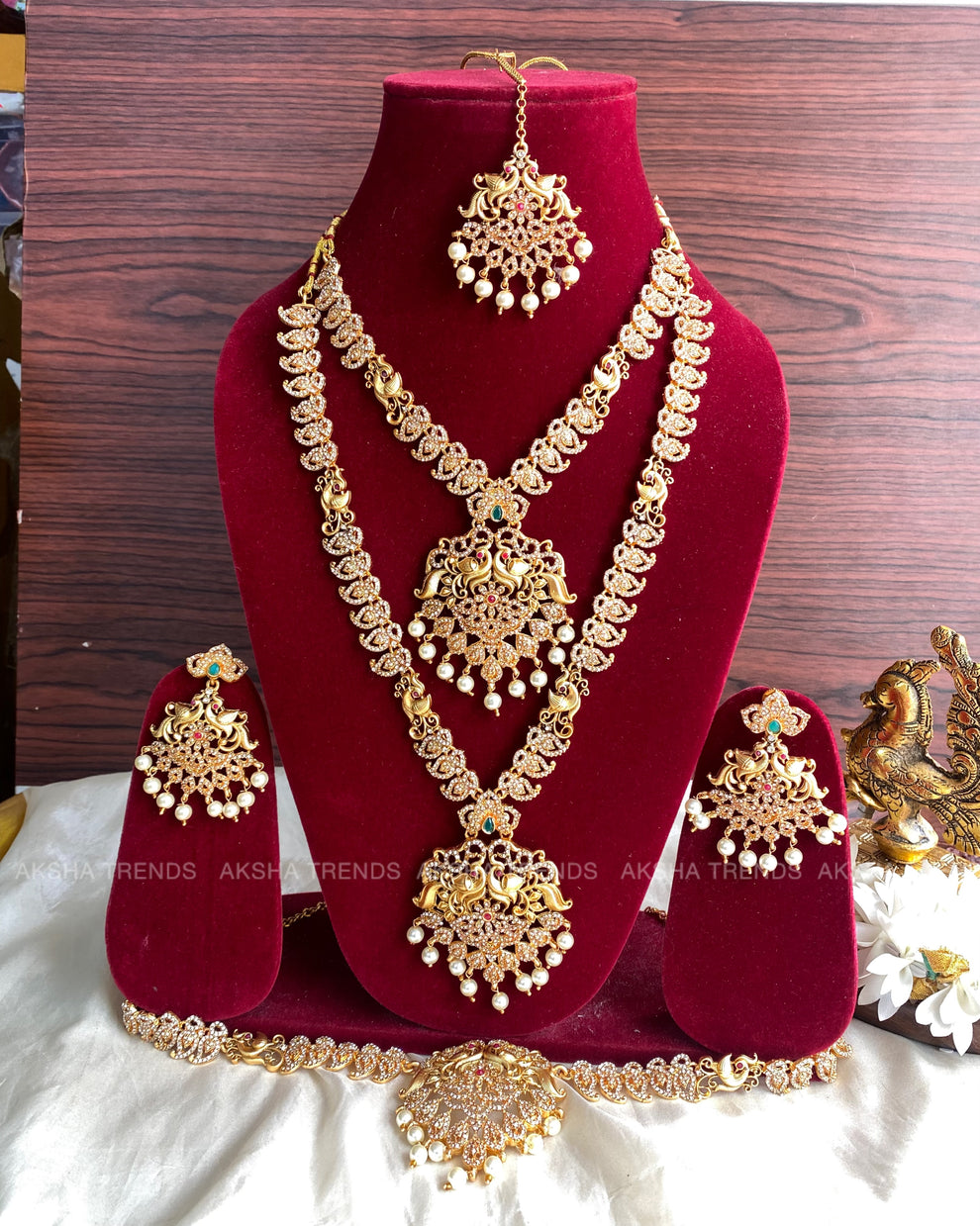 Peacock stone bridal combo Aksha Trends 