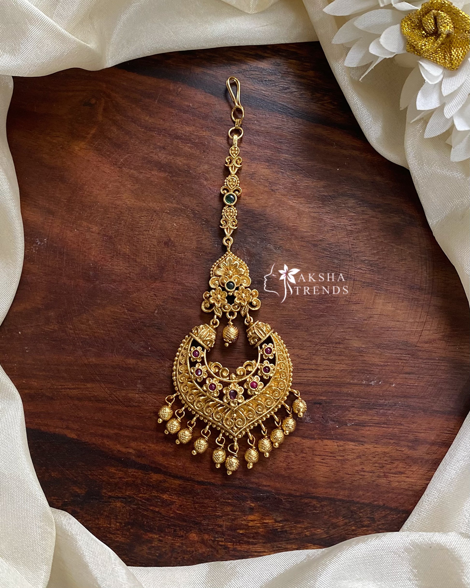 Premium gold tikka Aksha Trends