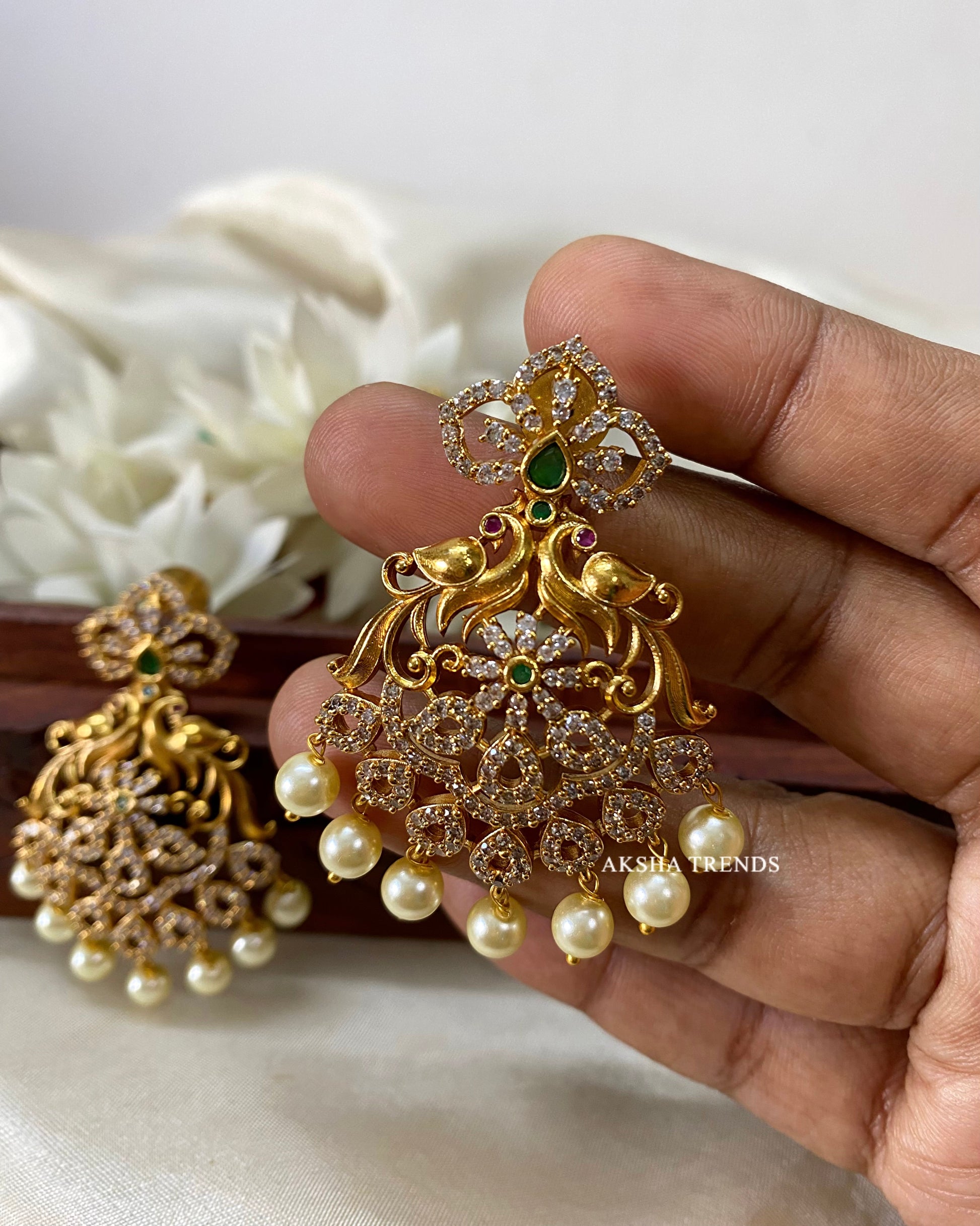 Thogai diamond earrings Aksha Trends