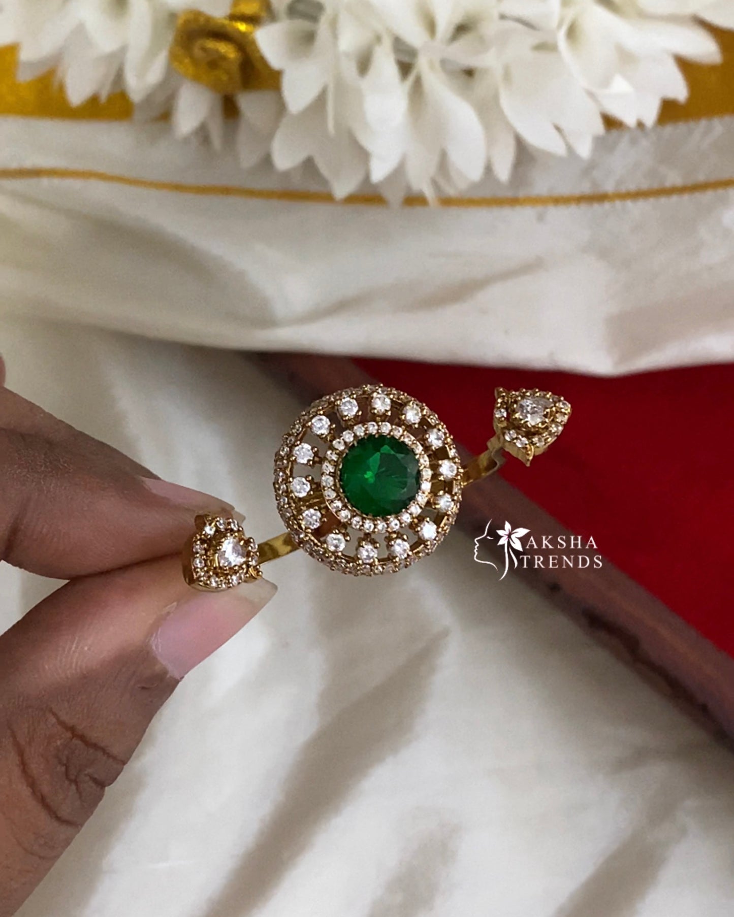 Royal diamond finger rings -green Aksha Trends