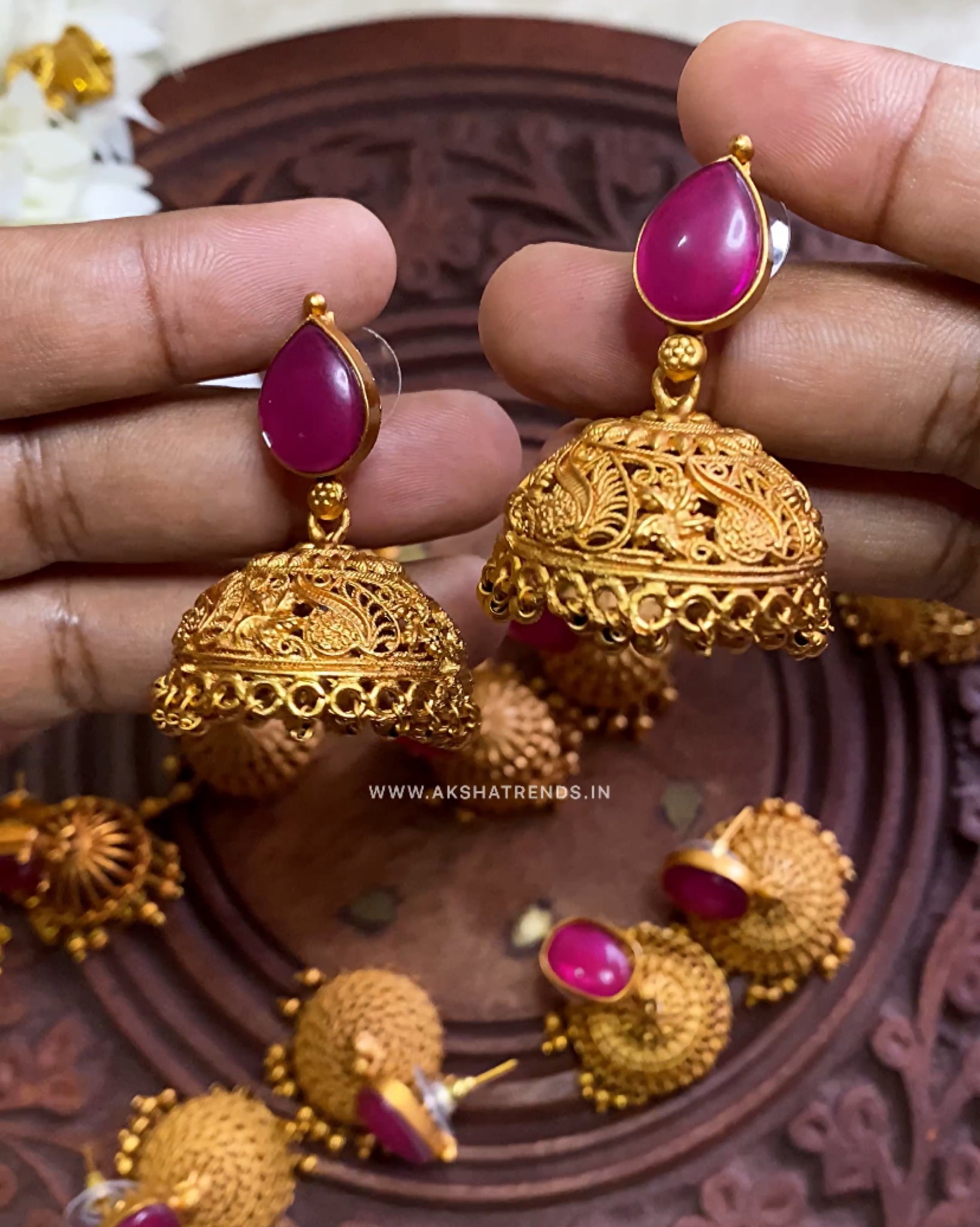 Heavy jhumkas hot sale in gold