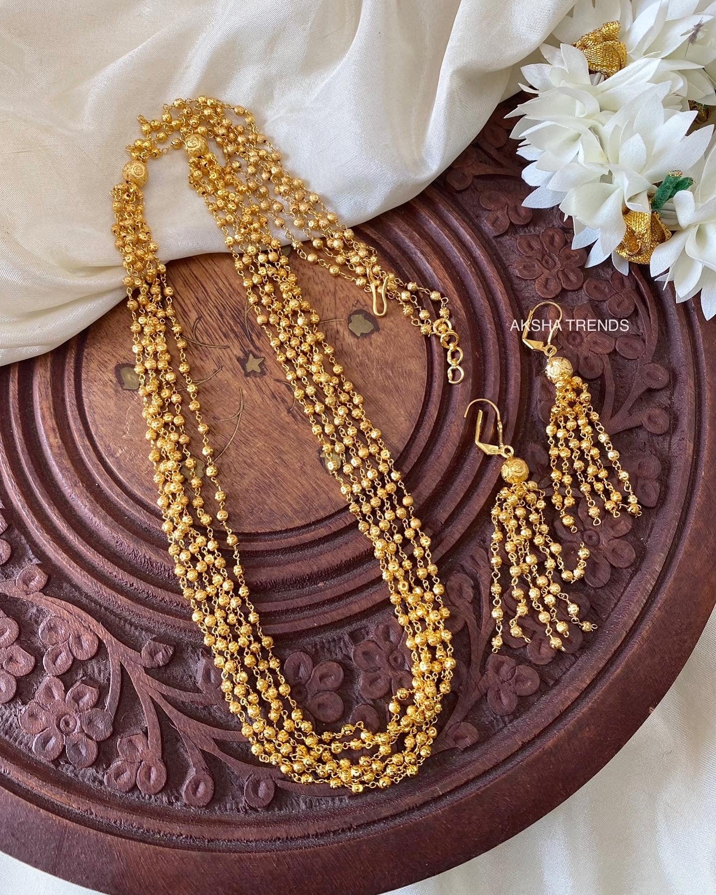 8 layer gold pearl chain set Aksha Trends