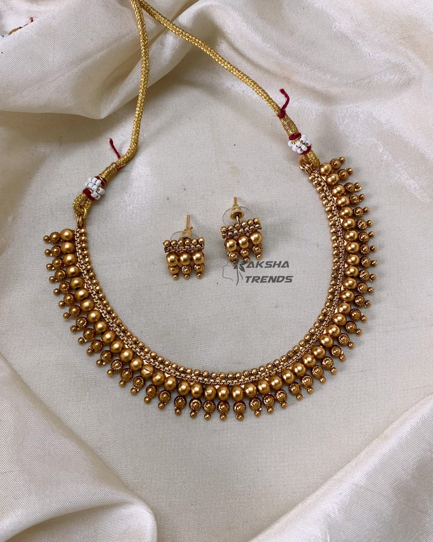 Golden bead necklace
