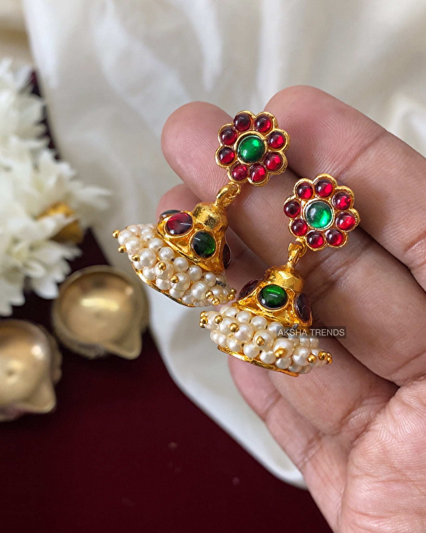 Maddy Space silver Jhumka earrings (maroon) .