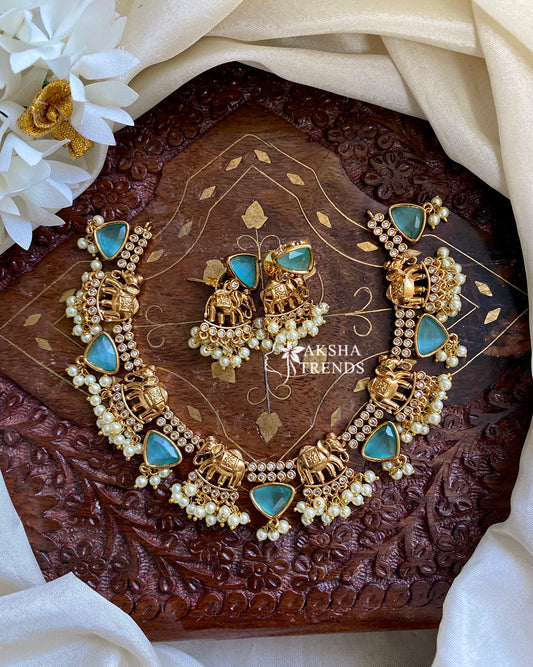 Golden Elephant Necklace -Blue Aksha Trends