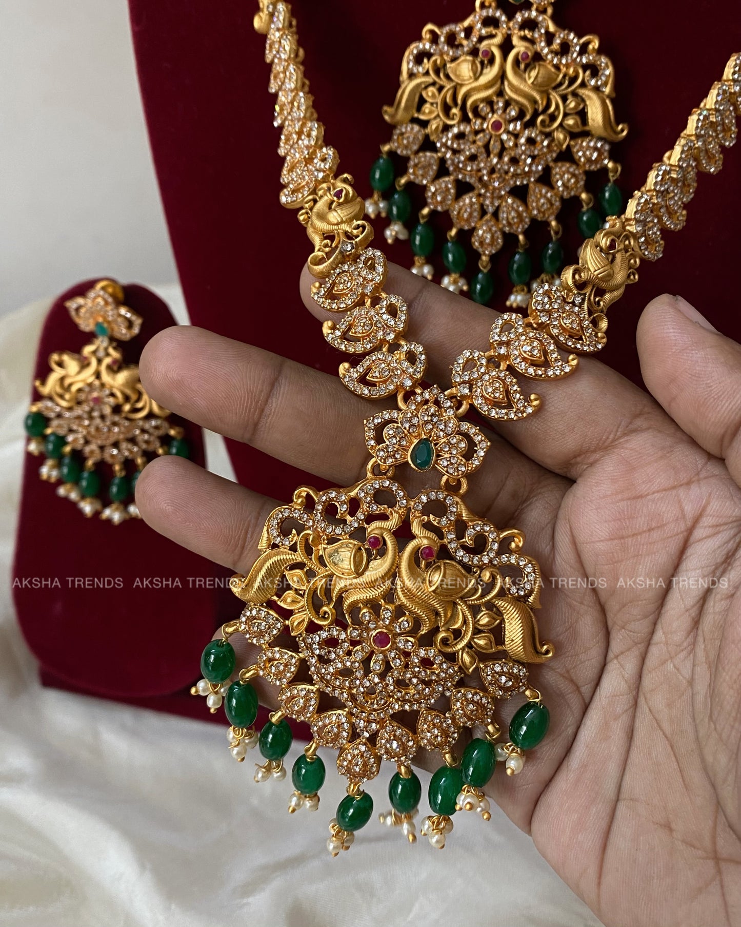 Peacock stone bridal combo -Green Aksha Trends