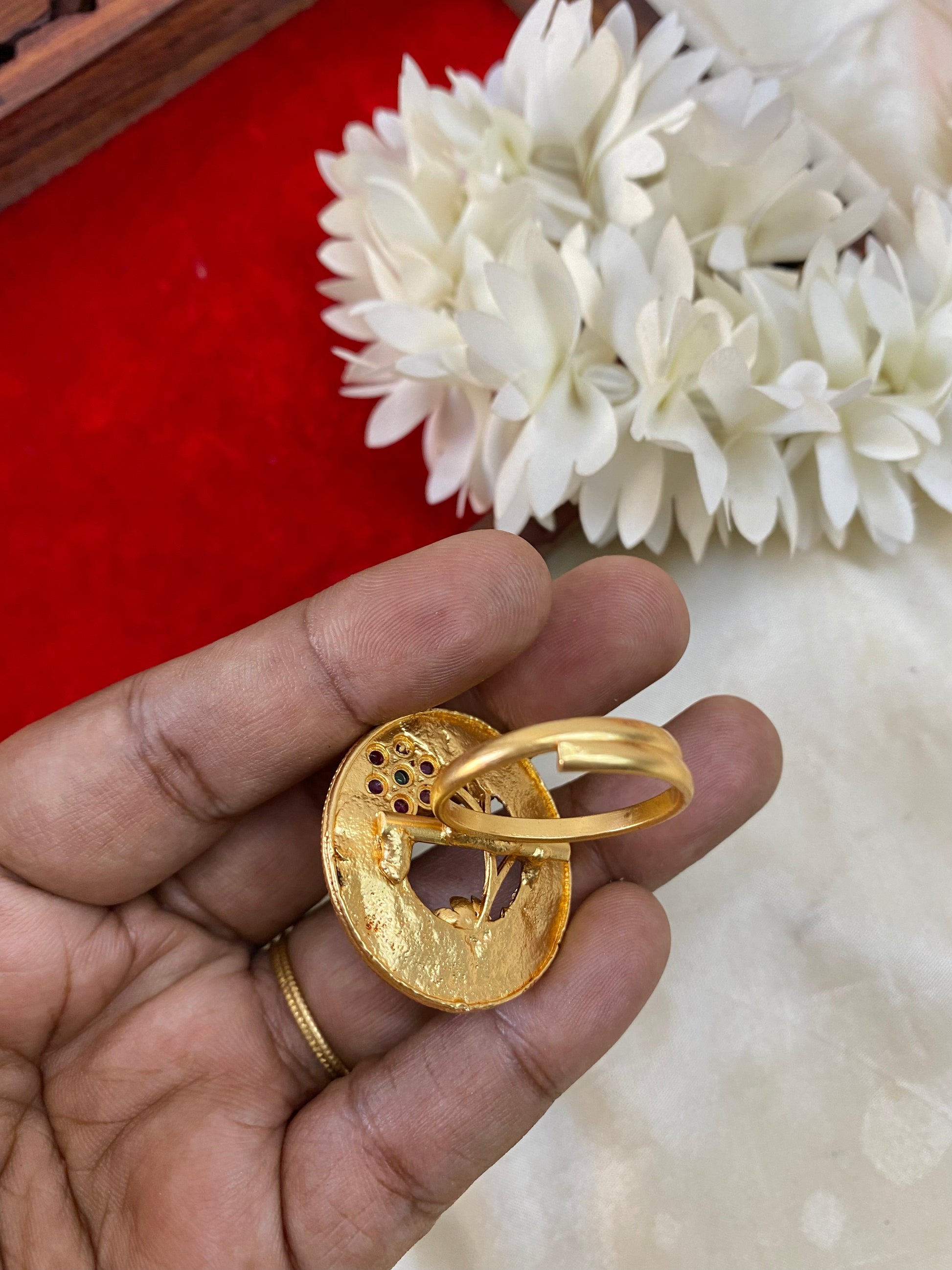 Golden floral finger rings Aksha Trends