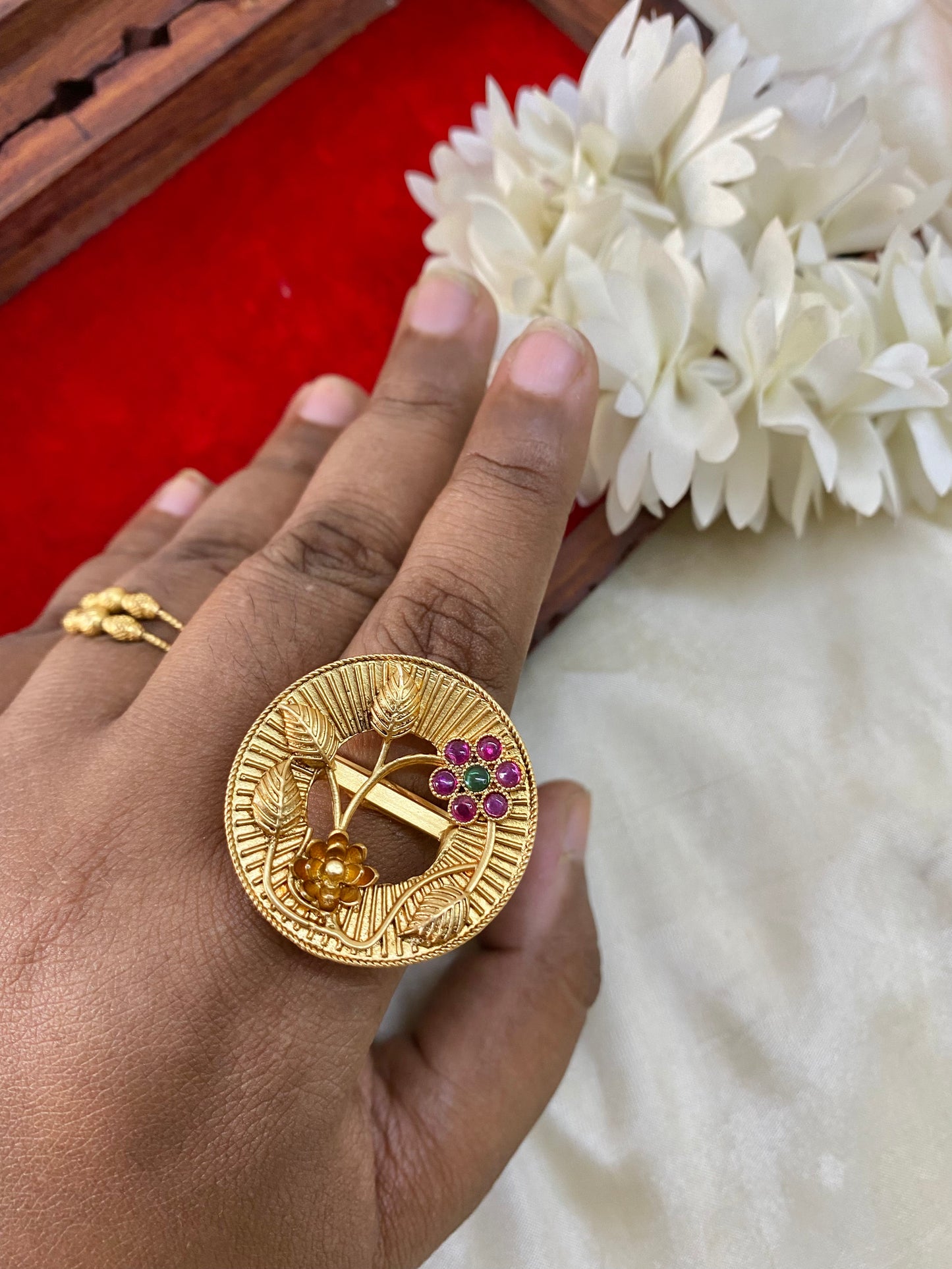 Golden floral finger rings Aksha Trends